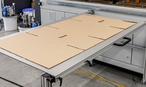 Caisse en sortie de machine